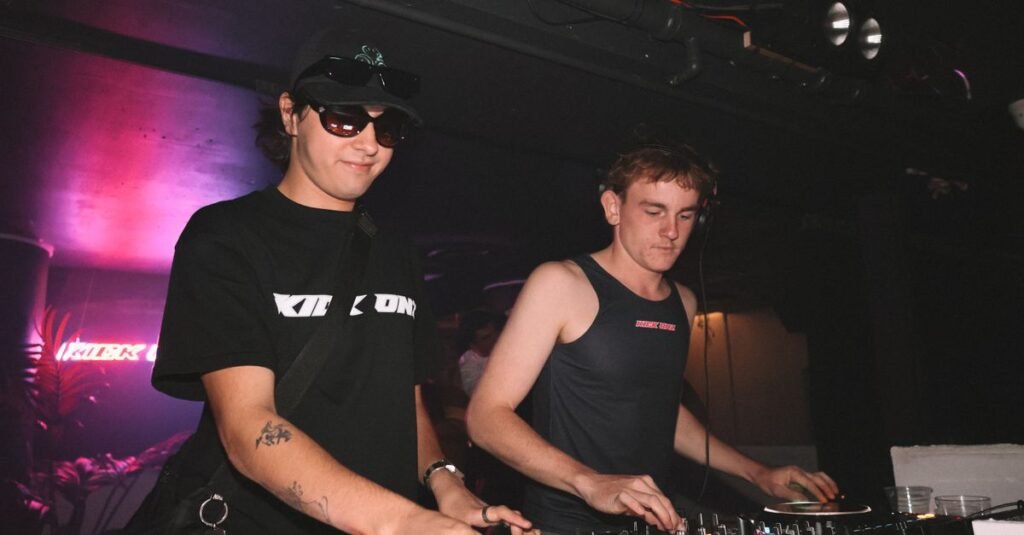 how traxsource charts work - DJ performing in a club